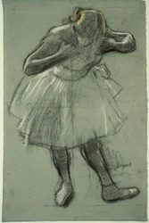 Danser bøjer sig fremad