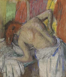 Kvinde tørrer ryggen, ca. 1895.