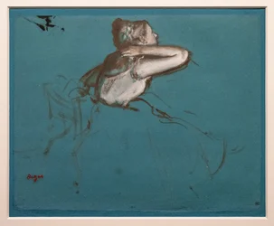 Siddende danser drejet til højre (studie til den siddende figur af "Repetition de ballet sur la scène"). 1873. Olie og maling har essens på papir