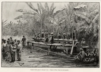 Batak-kvinder, etnisk gruppe i det nordlige Sumatra, banker og renser ris. Gravering af Riou for at illustrere historien "et år i Malaysia" af Jules Claine (1856-1939)