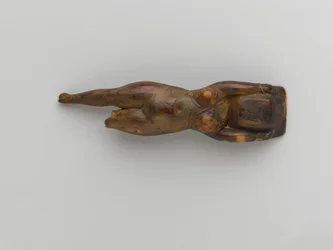 Toiletfad holdt af en figur af en flydende kvinde fra Saqqara
