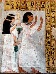 Egyptisk antikvitet: tegn i tilbedelse. Roys grav (TT255). 18. dynasti. Fra Vestbredden af Luxor, Egypten - Det gamle Egypten: Osiris bliver tilbedt af et par. Roys grav (TT 255). 18. dynasti. Fra vestbredden af Luxor, Egypten