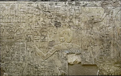 Egyptisk antikvit: fremstilling af bærere af offergaver. Lavt relief fra Vizir Ramoses grav (18. dynasti). Luxor, Theben, de adeliges dal Egypten