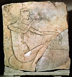 Relief, der viser en prinsesse, der spiser en stegt and, fra Nordpaladset ved Tell El-Amarna, New Kingdom, ca. 1353-1337 f.Kr. (kalksten)