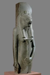 Gudinden Sekhmet holder et scepter i form af en papyrusstængel ...