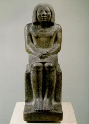 Siddende mandsfigur, Egypten, Ankh, 3. dynasti (porfyroid granit)