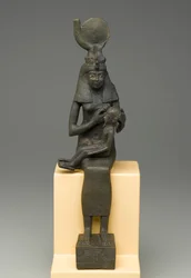 Siddende statuette af Isis, der holder Horus (bronze)