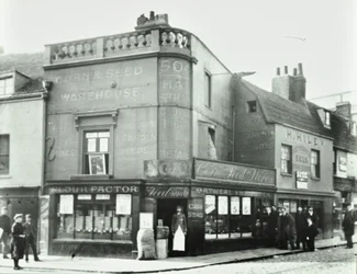 Deptford Broadway: gadebillede med butiksfacader, London, 1897