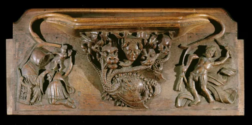 En misericord, der skildrer en kunstfærdigt udskåret hydra, symbolsk for de syv dødssynder, med et realistisk menneskehoved, New College Chapel, Oxford, slutningen af det 14. århundrede (træ)