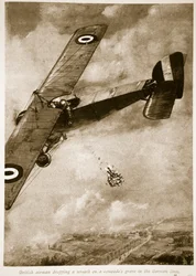 Britisk flyver taber en krans på en kammerats grav i de tyske linjer, 1914-19