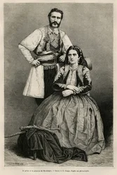 Portrætter af fyrst Nikola 1. Petrović-Njegoš af Montenegro (1841-1921) og hans hustru Milena, født Vukotić (1847-1923), tegning af E. Ronjat til illustration af Charles Yriartes (1832-1898) rejse til Montenegro i 1874. Stik i Le Tour du