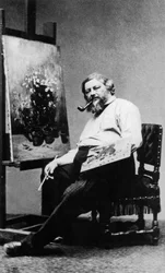 Gustave Courbet (1819-1877) fransk maler i sit værkstedsatelier, ca. 1876, foto Etienne Carjat