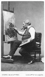 Gustave Courbet maler på sit staffeli (foto)