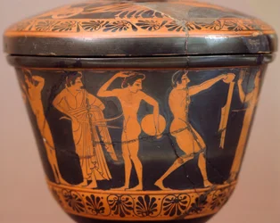 Pyxis med atleter, der udfører diskos og andre discipliner. Keramik med rød figur, fra Cerveteri (Lazio). Etruskisk civilisation, 4. århundrede f.Kr.