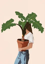 Kvinde med en plante i hånden