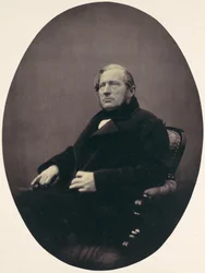 [Mand siddende i lænestol], 1850