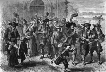 Bretonsk skik: par unge ægteskaber ved udgangen af kirken. I toppen af kortegen er spillere af biniou og tromme. Treguennec, Finistere (29)
