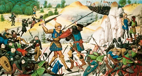 Ridder Roland, nevø af Karl den Store, døde i slaget ved Roncevaux (778) mellem Karl den Stores og saracenernes våben. Miniature af det 14. århundrede.