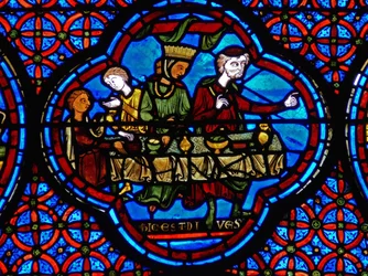 Detalje fra et vindue, der viser lignelsen om Lazarus og dyk