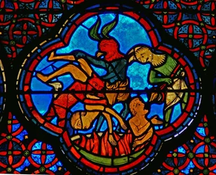 Detalje fra et vindue, der viser lignelsen om Lazarus og Dives: den rige mand i helvede