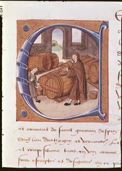 Detalje af en historisk initial med en illustration af en vinbonde i arbejde, fra 
