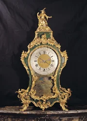 Louis XV Style ur overvundet af en kinesisk mand (ormolu)