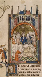 Royal 14 E. III, f.89, Kong Arthurs Fest, Kong Arthur og Guinevere ved en banket, med en tjener knælende foran bordet, der skærer brød, fra 