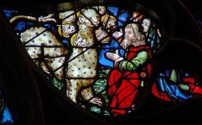 Vinduet med vestrosen viser en scene fra Åbenbaringens Bog: Tilbedelse af udyret (13:8)