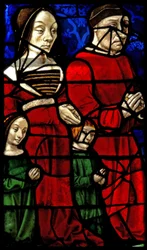 Vindue E1 viser donorerne hertug Jean II de Bourbon og hans kone Catherine