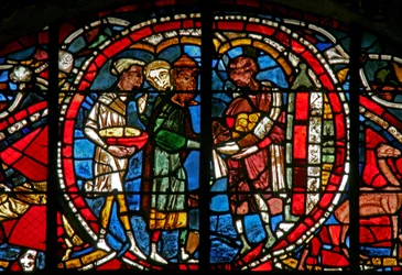 Window w12-R, der viser en scene fra historien om den fortabte søn: han modtager sin arv