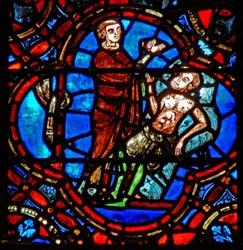 Vindue w12, der viser en scene i det barmhjertige samaritanske vindue: en anden rejsende ser den sårede pilgrim