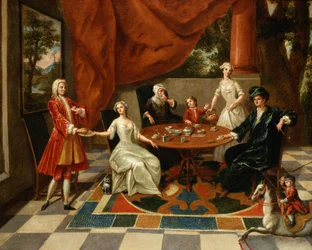 En elegant familie, der tager te