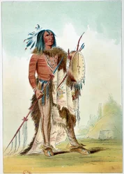Amerikas indianere: portræt af en indianerhøvding, som blev læge, og som holder en tam-tam (tam-tam), hvori remedierne findes. Illustration af George Catlin (1794-1872)