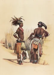 To unge zulu-mænd, udsmykket i livlige traditionelle dragter