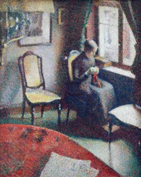Kvinde syr ved vinduet