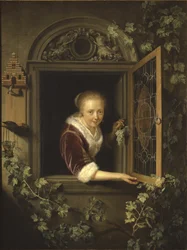 Ung kvinde ved vinduet med en klase vindruer, 1622