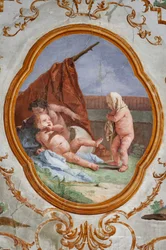 Gæstelogi, Puttis værelse, medaljon med putti: "The Disguise"