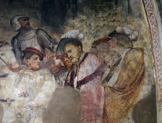 Soldat iført rustning og mænd iført hatte, detalje af en fresco af Girolamo Romanino (ca. 1484-efter 1562), venstre væg i præsbyteriet i Church of Saint Anthony Abbot, Breno. Italien