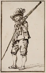 En stående soldat med en musket over skulderen