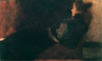 Dame ved pejsen
