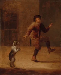 En mand danser med en hund