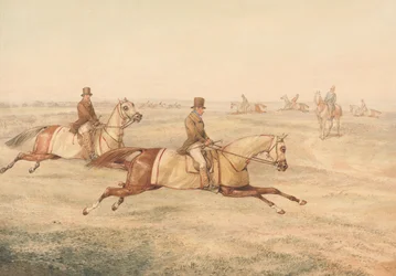 To ryttere træner heste i galop