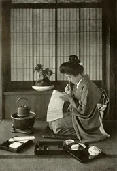 Skriver et brev, 1910.