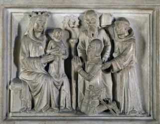Madonna og barn, med en kriger og helgener, relief skabt af The Masters of Campione. Italien