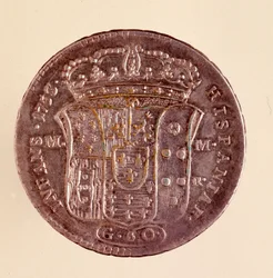 Sølv piastra fra Napoli: Karl III af Spaniens regeringstid (1716-1788). 1750. Diameter. 4 cm Napoli, arkæologisk museum