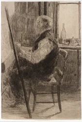 Kunstner siddende ved staffeliet