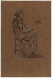 Kvindefigur, siddende