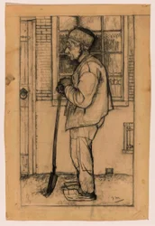 Douwe i profil, stående foran et hus med en spade