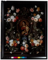 En stenkartouche prydet med blomster og sommerfugle