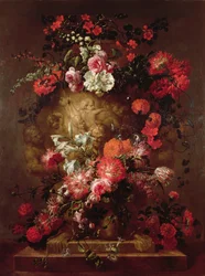 Blomster rundt om en kæmpe urne